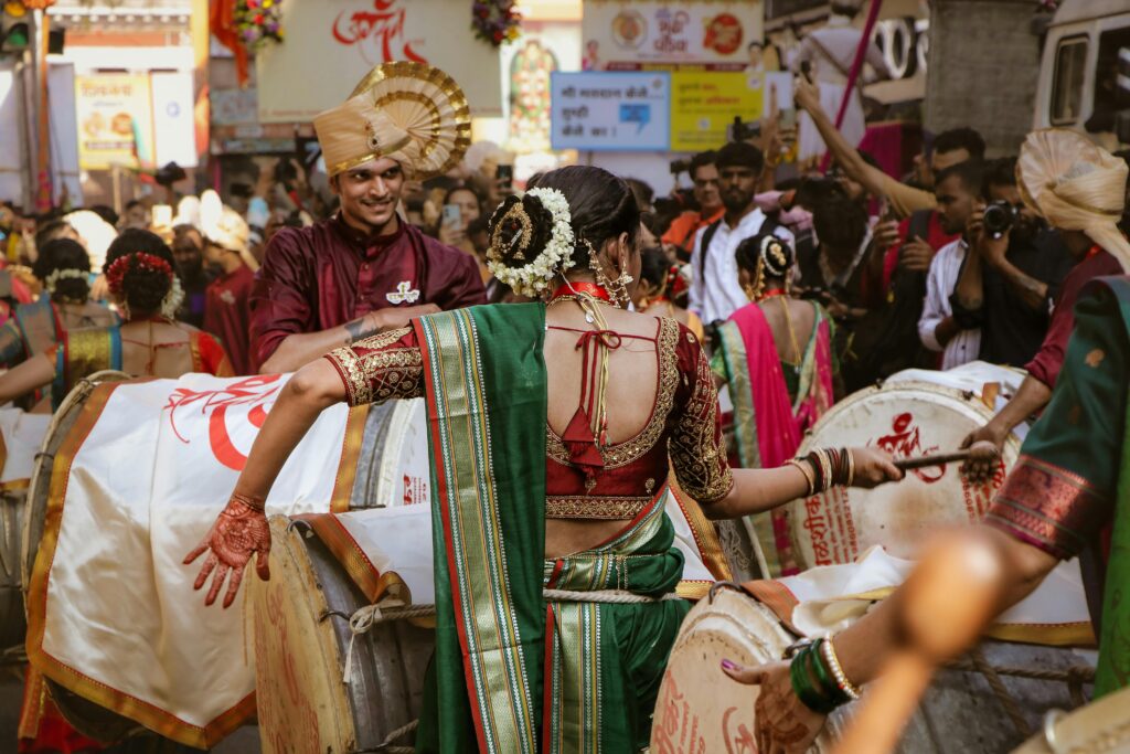 Vibrant street festival with traditional Indian attire and music, showcasing cultural heritage.